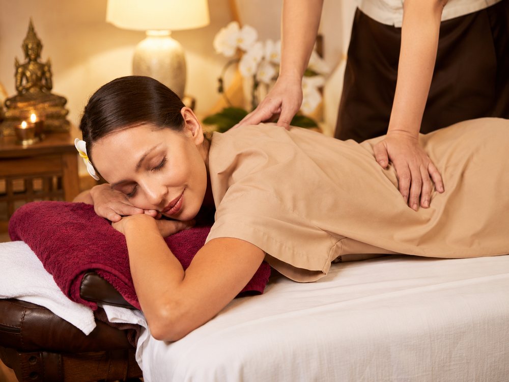 Traditional Thai massage on the mat
